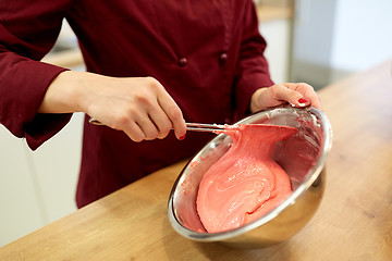 Image showing chef making macaron batter at confectionery