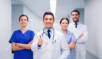 Image showing medics or doctors at hospital showing thumbs up