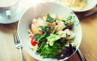 Image showing close up of caesar salad on plate at restaurant