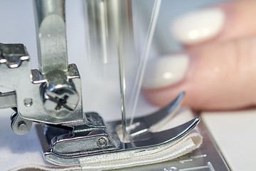 Image showing sewing machine and the needle