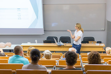 Image showing Instructor teaching first aid cardiopulmonary resuscitation workshop.