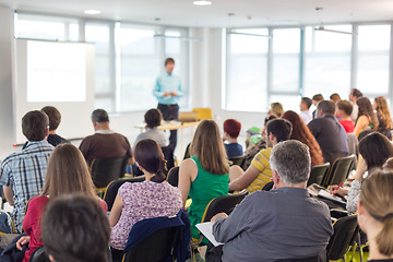 Image showing Speaker giving presentation on business conference.