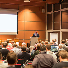 Image showing Business speaker giving a talk at business conference event.