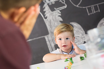 Image showing Cute little toddler boy at child therapy session.