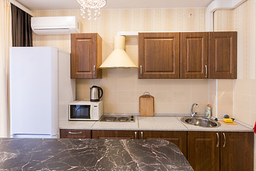 Image showing The interior of a modern budget kitchen in a newly built apartment