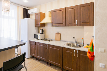 Image showing Interior of a modern spacious inexpensive kitchen