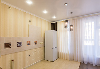 Image showing Interior of an empty kitchen without furniture, view of the place for a kitchen unit