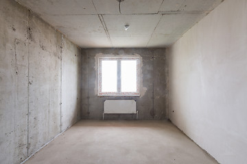 Image showing Room in new building without repair, partially plastered walls