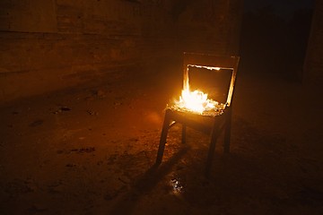 Image showing Chair on fire
