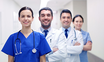 Image showing group of happy medics or doctors at hospital