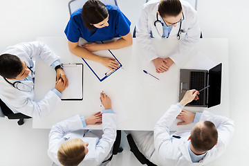 Image showing group of doctors on conference at hospital