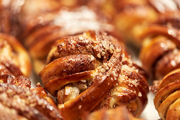 Image showing close up of buns or pies at bakery