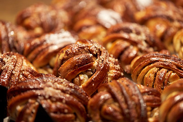 Image showing close up of buns or pies at bakery