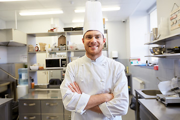 Image showing happy male chef cook at restaurant kitchen