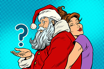 Image showing Santa Claus and beautiful woman, a surprise Christmas gift