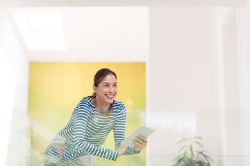 Image showing young woman at home websurfing