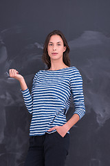 Image showing woman standing in front of chalk drawing board