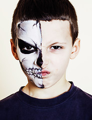 Image showing little cute boy with facepaint like skeleton to celebrate hallow