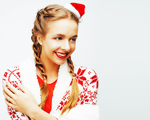 Image showing young pretty happy smiling blond woman on christmas in santas re