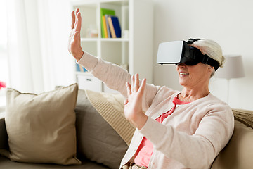 Image showing old woman in virtual reality headset or 3d glasses