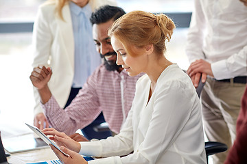 Image showing business team with tablet pc computer in office