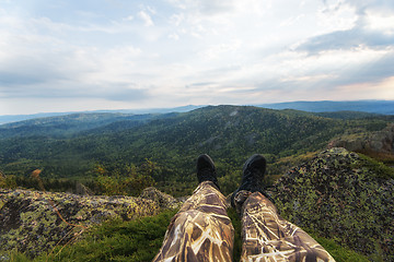 Image showing Man resting in the mountains