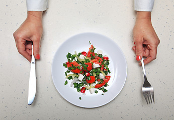 Image showing hands with kitchen flatware 