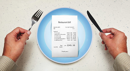 Image showing bill on empty plate for visitor