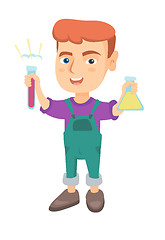 Image showing Little caucasian boy holding test tube and beaker.