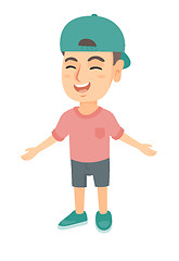 Image showing Caucasian cheerful boy in a cap laughing.