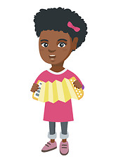 Image showing African-american girl playing the accordion.