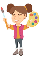 Image showing Happy girl drawing with colorful paints and brush.