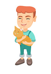 Image showing Caucasian happy boy holding a cat.