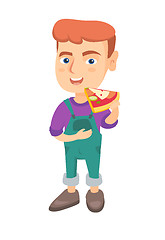 Image showing Caucasian boy eating tasty pizza.