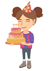 Image showing Caucasian child holding birthday cake with candles