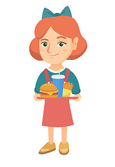 Image showing Little caucasian girl holding tray with fast food.