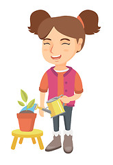 Image showing Caucasian girl watering plant with a watering can.