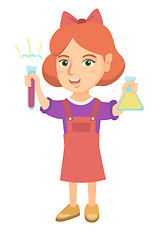 Image showing Little caucasian girl holding test tube and beaker