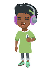 Image showing African girl listening to music in headphones.