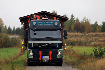 Image showing Volvo FM Truck Transports Wooden Cabin 