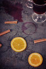 Image showing Spilled mulled wine and orange, retro toned