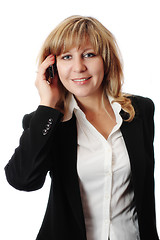 Image showing Successful smiling woman talking on mobile phone