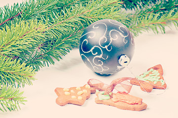 Image showing Gingerbread cookies with christmas tree and ball, retro toned