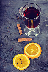 Image showing Red mulled wine and different spices, retro toned