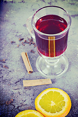 Image showing Red mulled wine with spices, retro toned