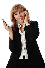 Image showing women simultaneously talking on two phones