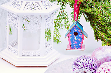 Image showing Christmas toy birdhouses and other decorations, retro toned
