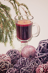 Image showing Red mulled wine and xmas decorations, retro toned
