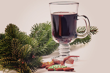 Image showing Red mulled wine and different decorations, retro toned