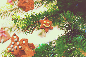 Image showing Gingerbread cookies on christmas tree, retro toned